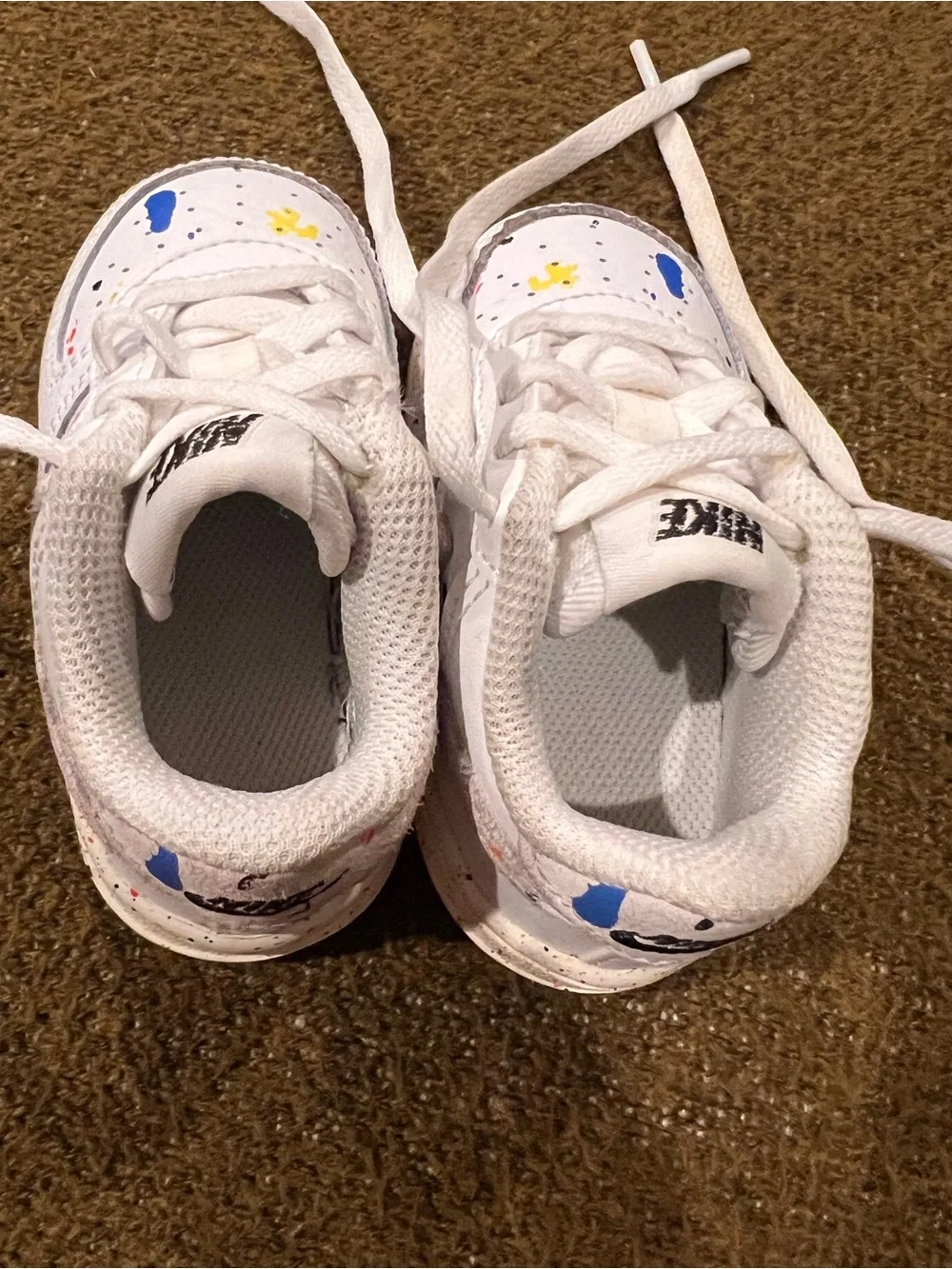 Nike Kids White Sneakers with Blue and Yellow Paint-Splatter